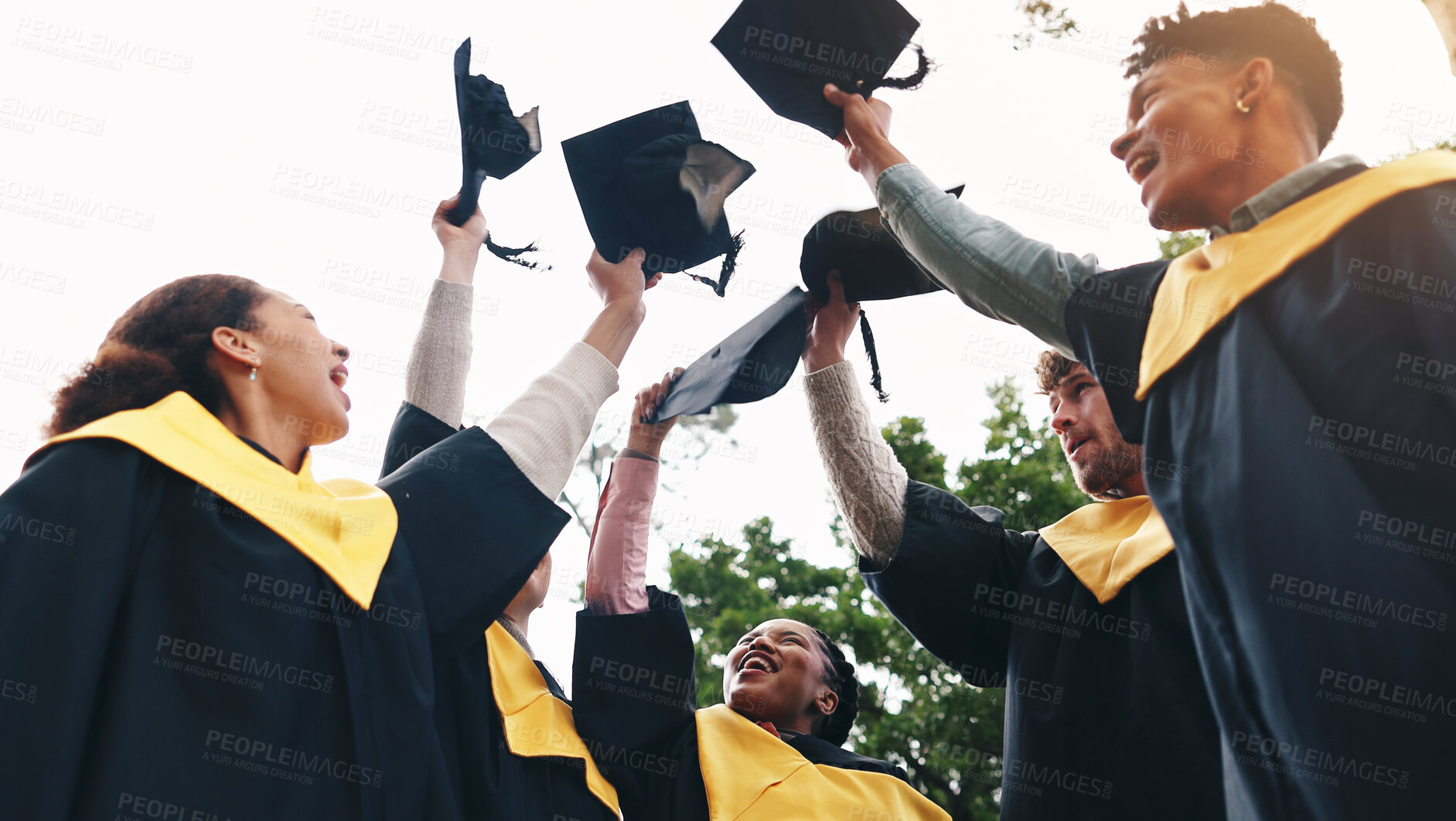 Buy stock photo Students, excited and graduation cap in sky on campus with celebration and success People, college and university classmate or friends with smile or happy for qualification, education and achievement