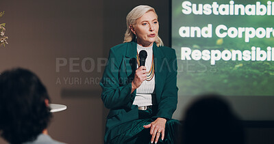 Buy stock photo Mature woman, stage and sustainability at seminar for information, knowledge and public speaking. Female person, presentation and screen at global summit for business and social responsibility