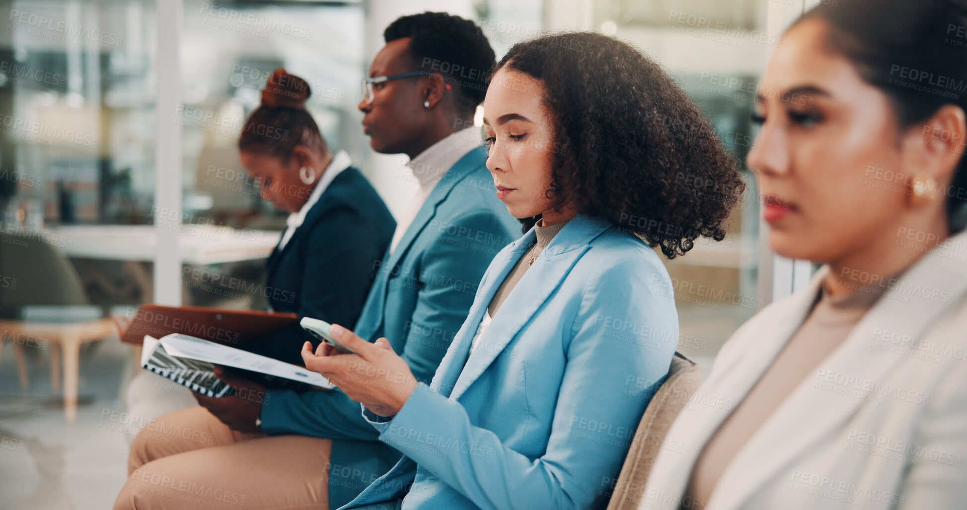 Buy stock photo Group of people, diversity and mobile phone in waiting room as candidates, job opportunity and interview for hiring. Staff, team and tech as employees at company in office, recruitment and hr process