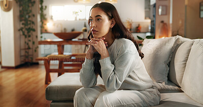 Buy stock photo Concern, thinking and worry with woman on sofa in living room of home for contemplation. Anxiety, depression and mental health with person in apartment for memories, nostalgia or weekend planning