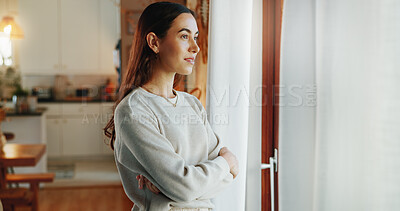 Buy stock photo Girl, arms crossed and thinking by window in home with daydreaming, reflection and happy memory in lounge. Woman, person and thoughtful in living room with wondering, remember or nostalgia with relax