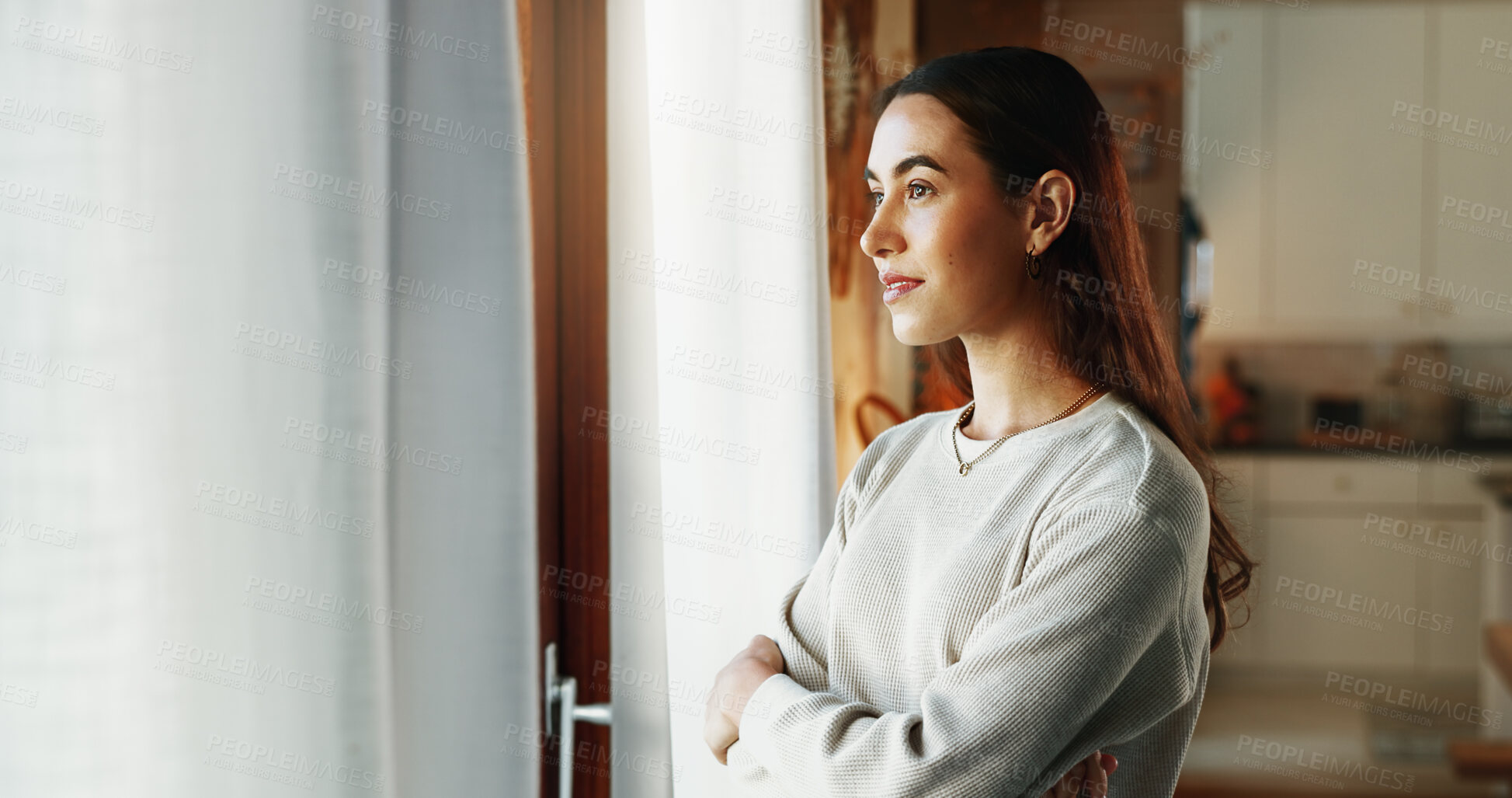 Buy stock photo Woman, arms crossed and thinking by window in house with daydreaming, reflection and happy memory in lounge. Girl, person or thoughtful in living room with wondering, remember or nostalgia with relax