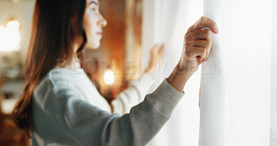 Buy stock photo Woman, window and open curtains in home for start day, fresh air and check weather in living room. Girl, person and drapes for awake, getting ready and morning routine with thinking of apartment view