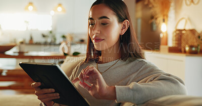 Buy stock photo Reading, relax, tablet with woman on sofa in living room of home for online shopping at night. App, ebook and technology with confident person in apartment for social media browsing on weekend