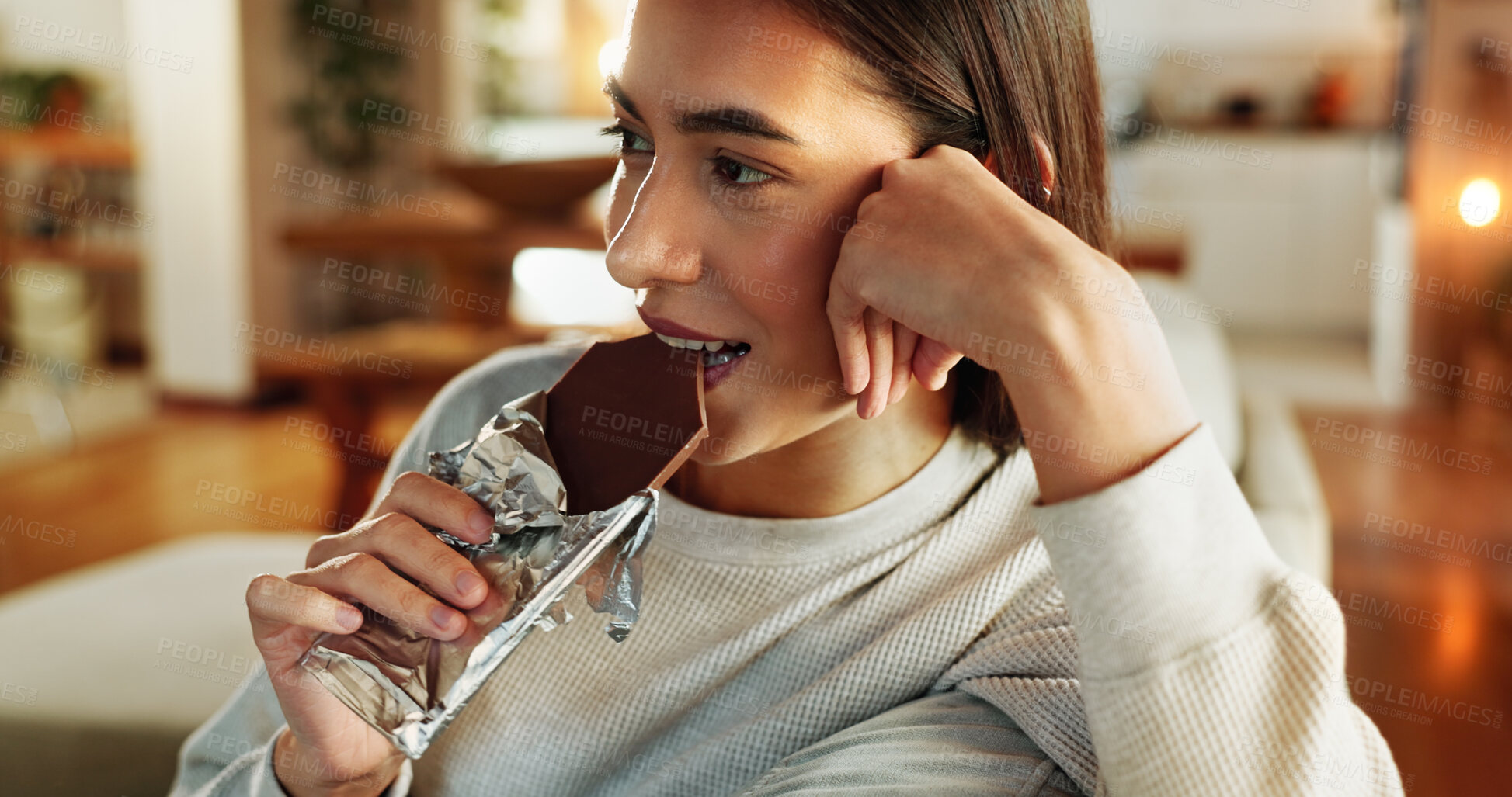 Buy stock photo Chocolate, smile and thinking with woman on sofa in living room of home for relax or wellness. Candy bar, idea and vision with face of happy person eating sweets in apartment for weekend time off