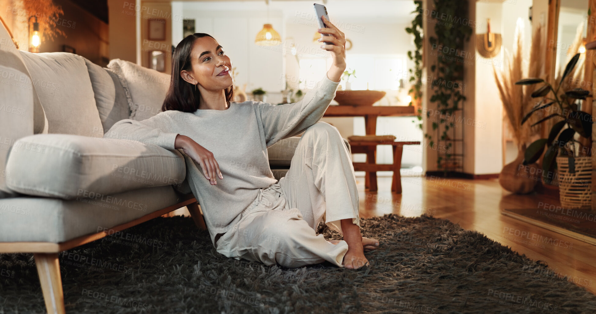 Buy stock photo Selfie, smile and wellness with woman on floor in living room of home for social media profile picture. App, photograph and relax with happy person in apartment for online or mobile status update