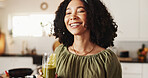 Woman, home and happy with green smoothie on glass for health, nutrition and diet. Female person, nutritionist and smile at kitchen with juice for supplements, detox and vitamins for wellbeing