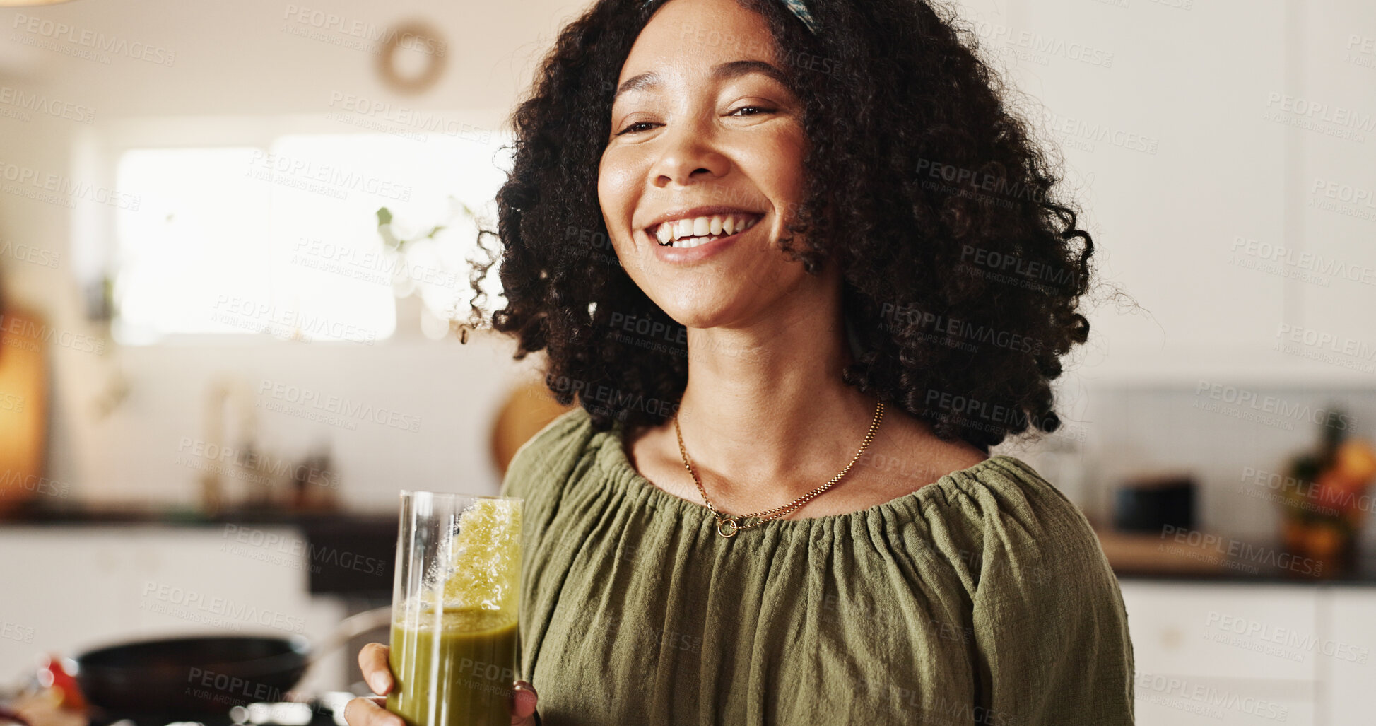 Buy stock photo Woman, home and happy with green smoothie on glass for health, nutrition and diet. Female person, nutritionist and smile at kitchen with juice for supplements, detox and vitamins for wellbeing