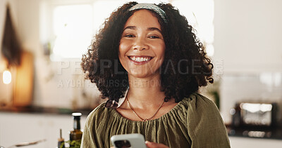 Buy stock photo Woman, portrait and mobile in kitchen for social media, text message and research recipe ideas. Girl, smartphone and happy in home for connectivity, communication and smile for weekend planning