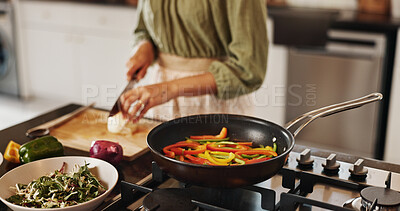 Buy stock photo Woman, hands and meal prep with pan for stir fry, food or vegetables in kitchen at home. Closeup, female person and cutting with organic ingredients for nutrition, diet or healthy recipe on stove