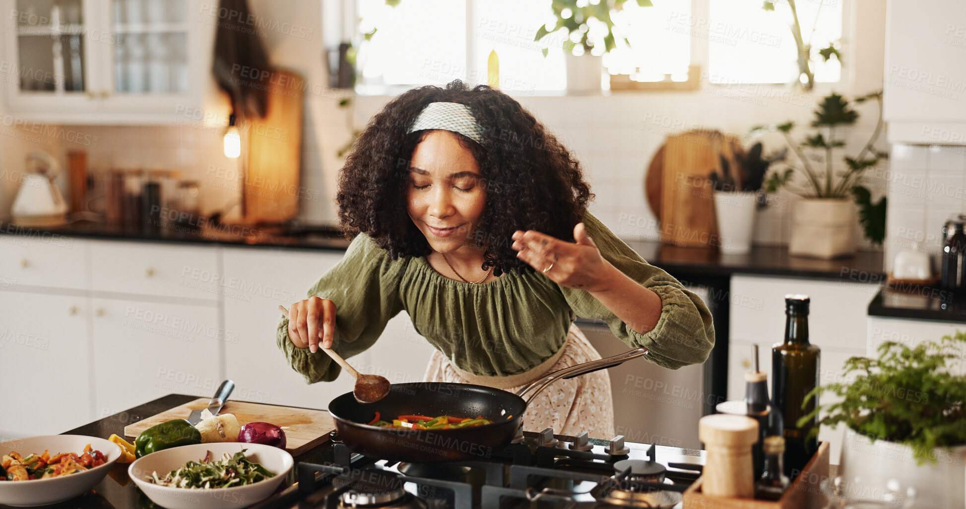 Buy stock photo Happy woman, cooking and smell with pan for stir fry, meal prep or food and vegetables in kitchen at home. Female person, chef and organic ingredients with stove for nutrition, diet or healthy recipe