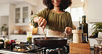 Hands, woman and pan on stove for cooking food, healthy meal prep and recipe for nutrition in kitchen. Person, frying or vegan dinner in pot for lunch, brunch and organic breakfast in home with smile