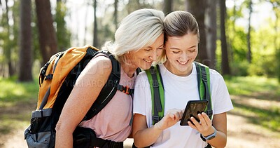 Buy stock photo Mama, adult daughter and smartphone with hiking, lost or fitness with vacation, bonding together and network. Nature, outdoor or hiker with mother, cellphone and woods with digital app or travelling