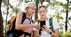 Mother, adult daughter and cellphone with hiking, app or fitness with vacation, bonding together and network. Nature, outdoor or hiker with mother, smartphone or woods with trees, travel or direction
