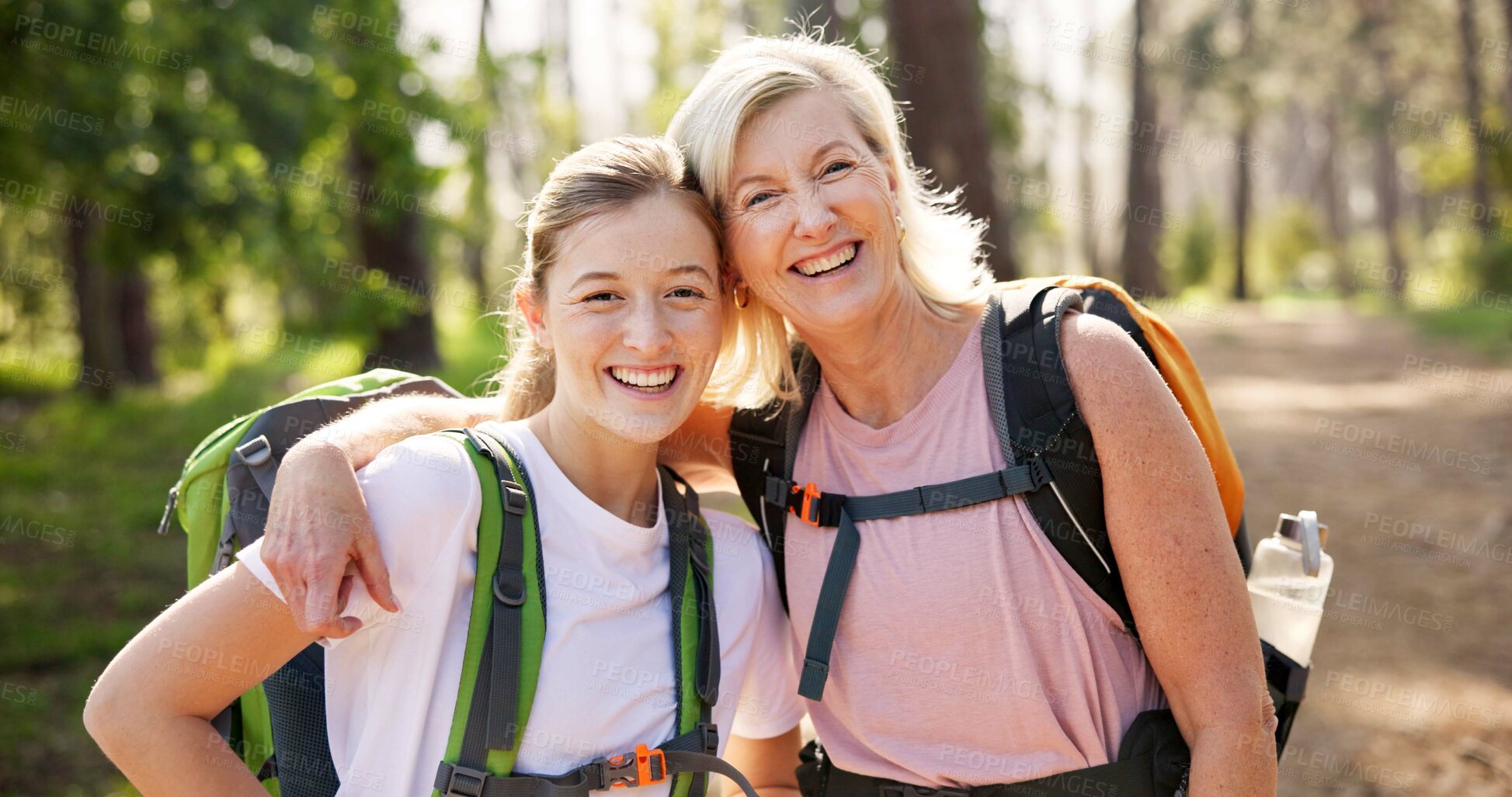 Buy stock photo Woman, mother and hiking in nature for portrait, love and care for healthy relationship. Mature mom, girl and happy in woods for journey, travel and summer adventure for wellness in environment