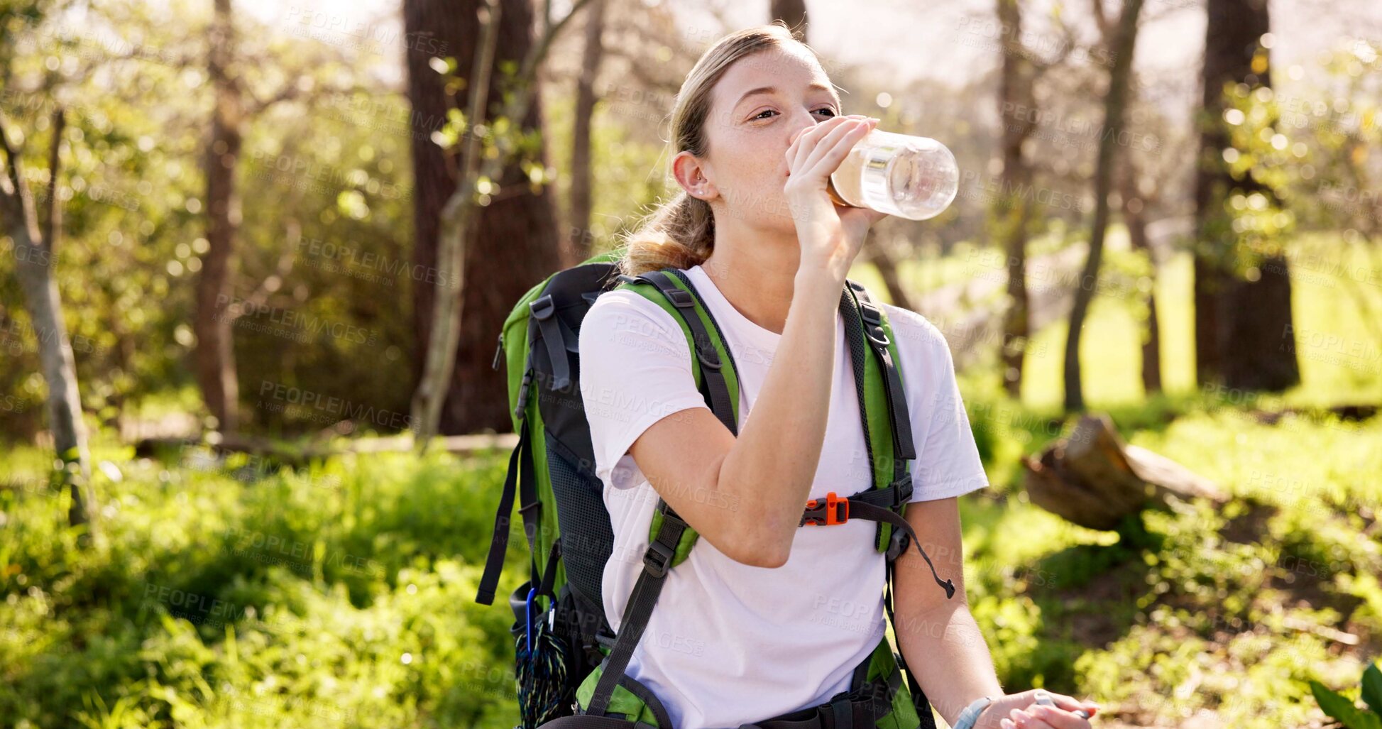 Buy stock photo Nature, drinking water and woman with rest for hiking, hydration and wellness on fitness break. Outdoor, female person and hiker on trail adventure with h2o liquid, thirsty and beverage for health