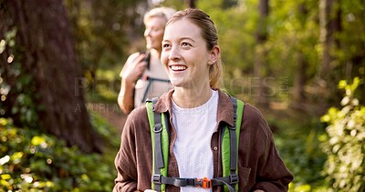 Buy stock photo Happy woman, hiking or forest with backpack for adventure, sightseeing or travel in nature. Female people, hiker or friends with smile, bag or equipment for outdoor trekking journey together in woods