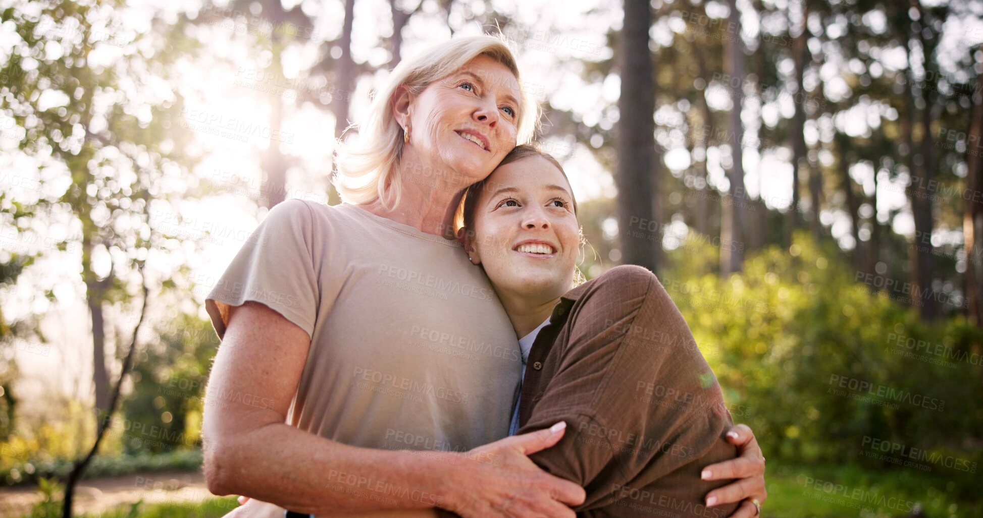 Buy stock photo Woman, mother and thinking in nature with hug, love and view for healthy relationship. Mature mom, girl and happy in woods for journey, hiking and summer adventure for wellness in environment