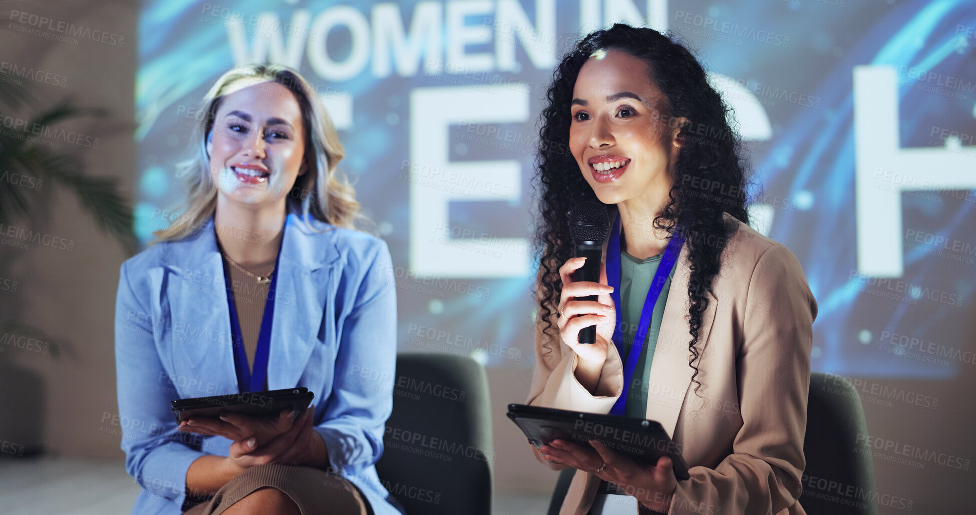 Buy stock photo Women, stage and speech with business people and technology for affirmative action, industry panel and keynote speaker. Event, summit and ai ethics with conference for audience, showcase and news