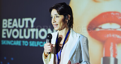 Buy stock photo Woman, presentation and speaker at convention with beauty, evolution and stage with mic for skincare. Person, speech and announcement for makeup, cosmetics and information at international conference