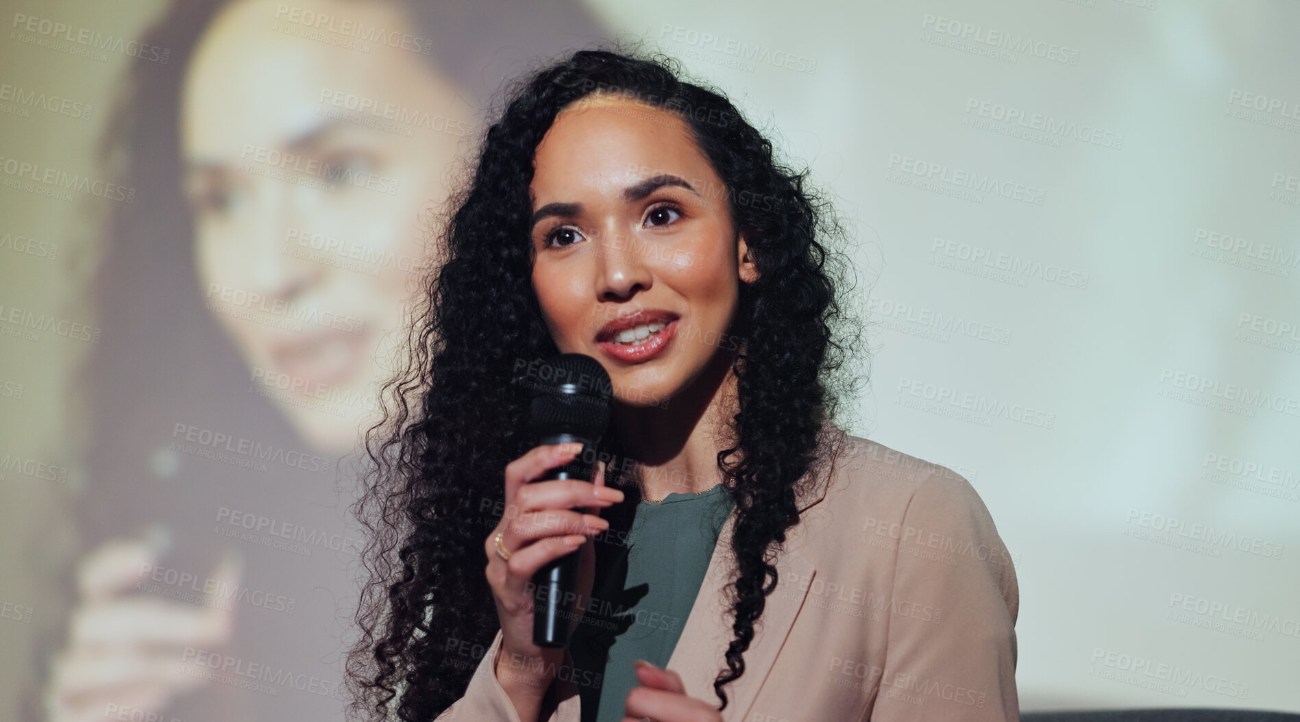 Buy stock photo Event, speaker and woman at conference with microphone, screen and presentation of business ideas. Speech, presenter and businesswoman on stage for seminar on development, growth and solution