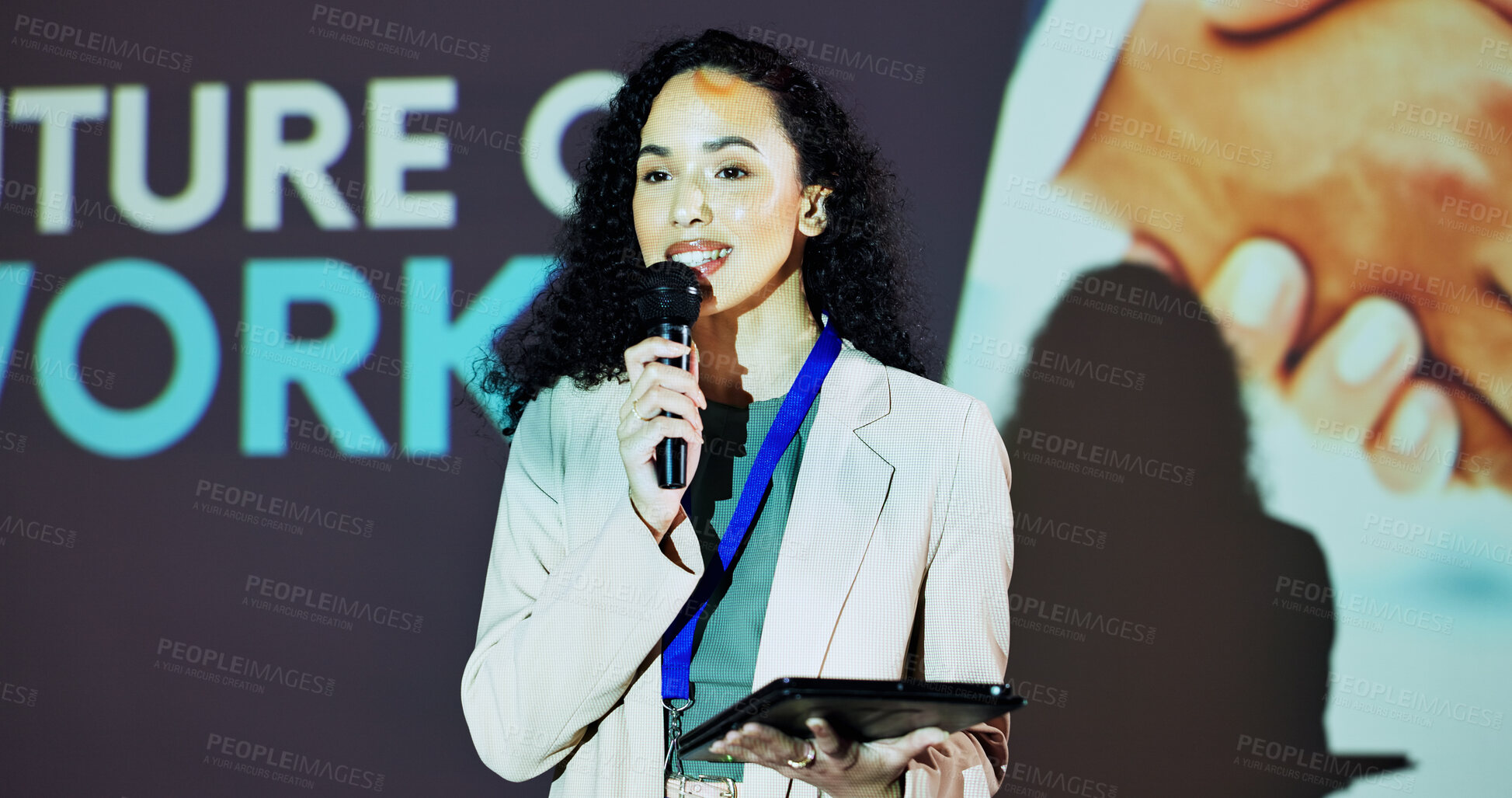 Buy stock photo Stage, presenter and woman at seminar on business transformation, growth or development idea. Technology, change and speaker with mic at future of work conference with discussion, progress and tablet