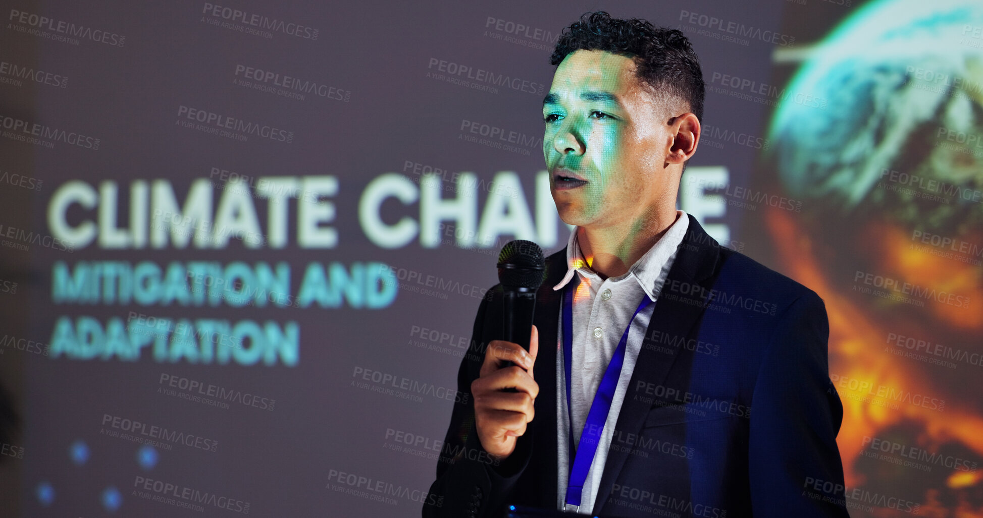 Buy stock photo Presentation, conference and man on a stage for climate change tradeshow, convention and seminar. Public speaking, audience and person with mic at event for environmental crisis and sustainability 