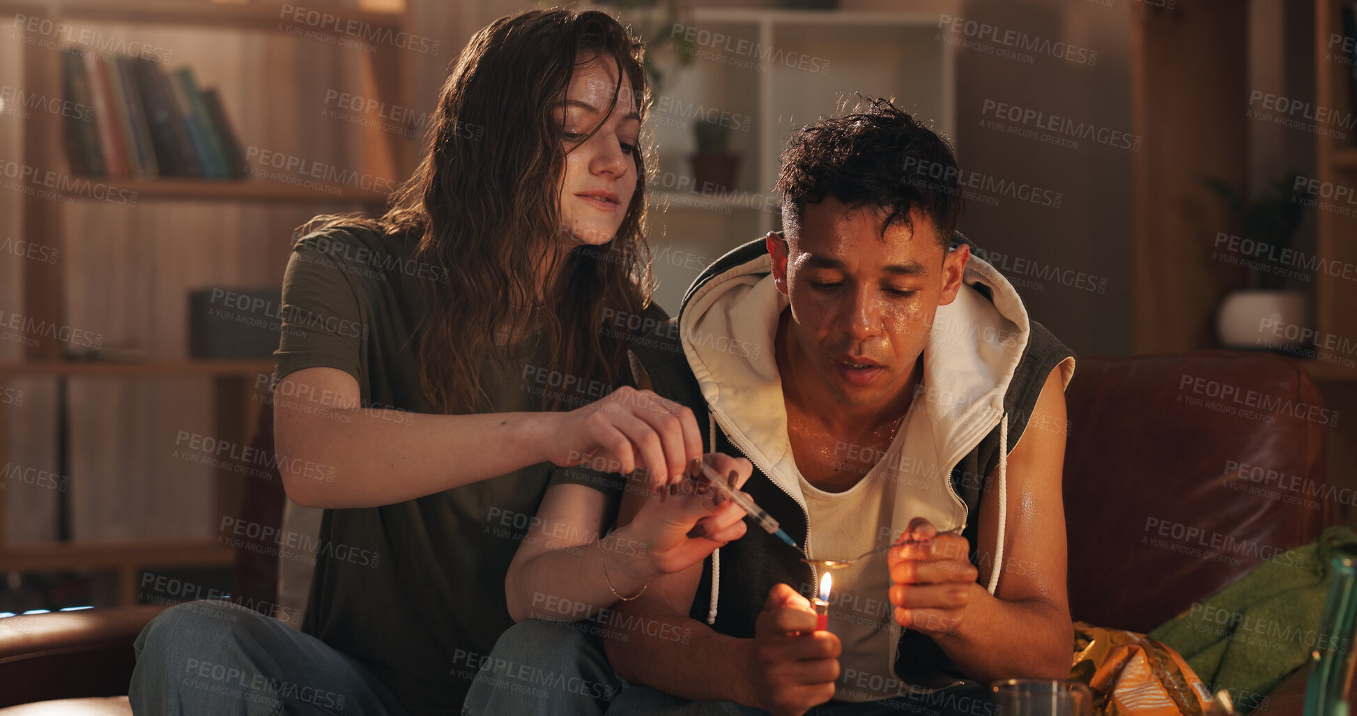 Buy stock photo Spoon, injection and couple with drugs in home for illegal, narcotics and substance abuse together. Opioid, needle and people burning heroin in syringe for addiction, danger and dependency crisis