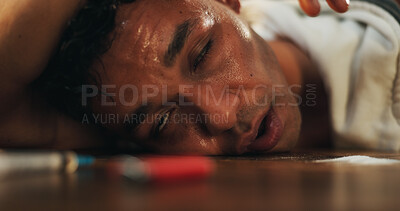 Buy stock photo Drugs, blackout and man with face on table, health risk and narcotic danger in apartment at night. Emergency, addiction and person in living room with overdose, fentanyl and opioid crisis in home