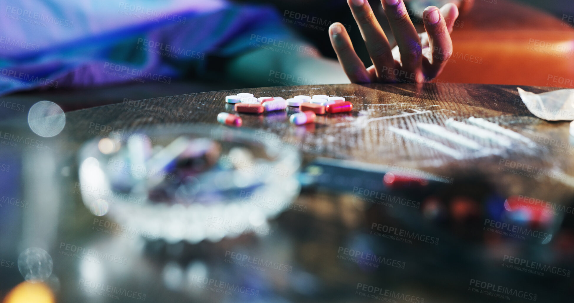 Buy stock photo Person, hand and overdose in home with drugs, accident and medical emergency. Victim, narcotics and death in living room with addiction, help and substance abuse awareness with crisis or consequence