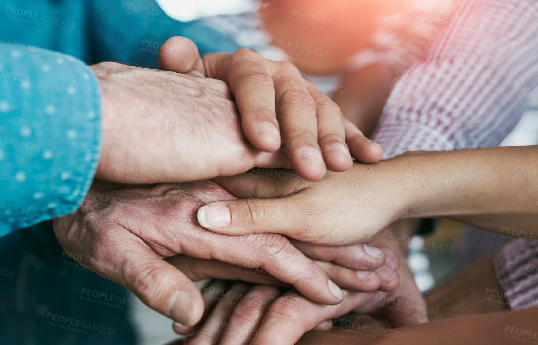 Buy stock photo Closeup shot of co-workers hand put together in an expression of unity and team spirit