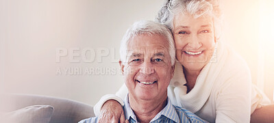 Buy stock photo Portrait of a senior couple relaxing at home