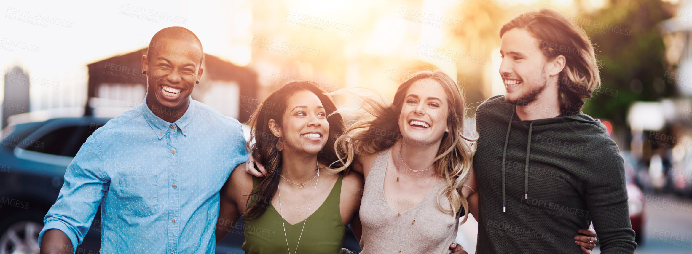 Buy stock photo Portrait of a group of friends taking a walk through the city together