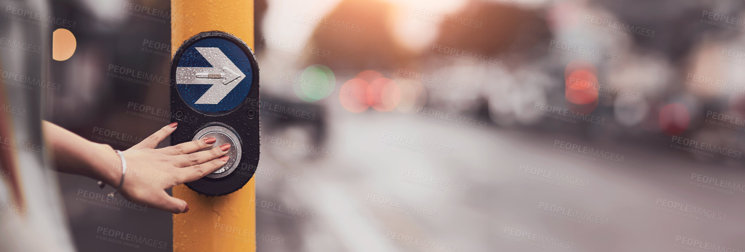 Buy stock photo Closeup shot of a woman pressing a button at a cross walk