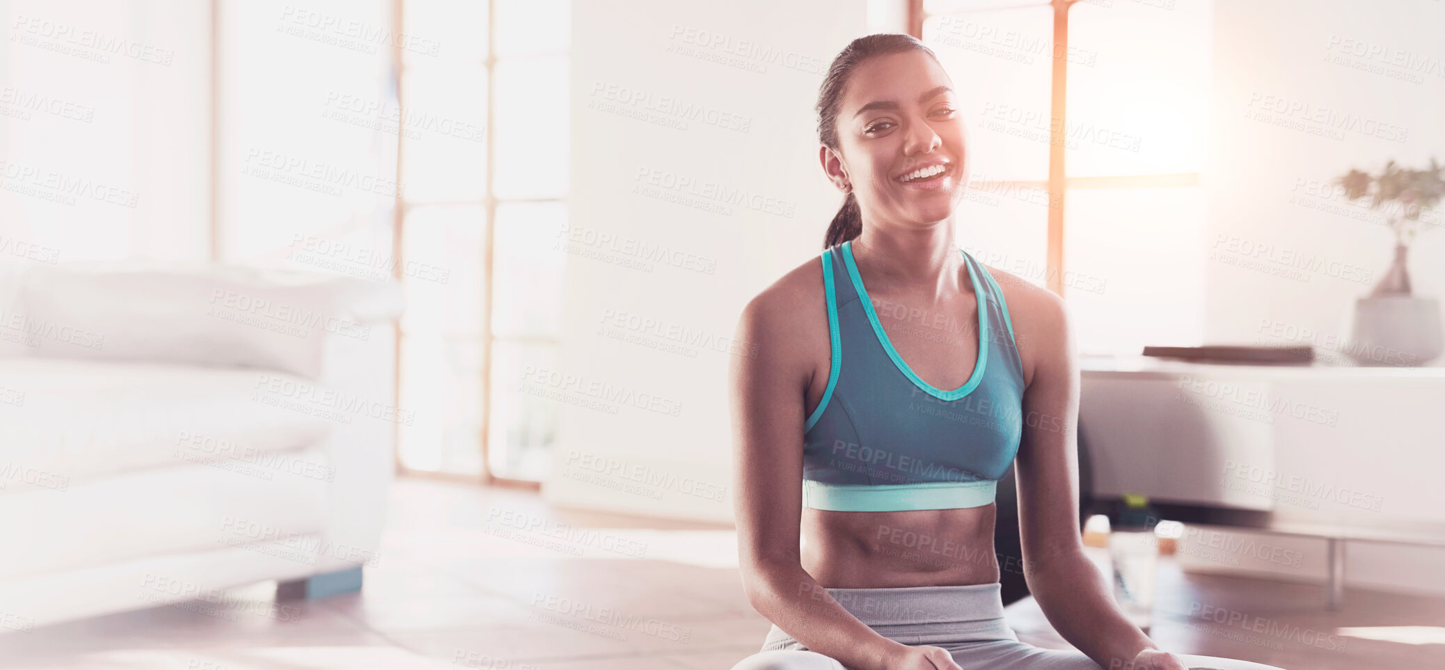 Buy stock photo Portrait of a young woman using a digital tablet while exercising at home