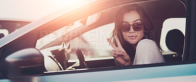 Buy stock photo Woman, car and sunglasses by window in summer for travel, freedom and vacation with sunshine outdoor. Girl, shades and relax with peace sign in motor for road trip, holiday or adventure in California