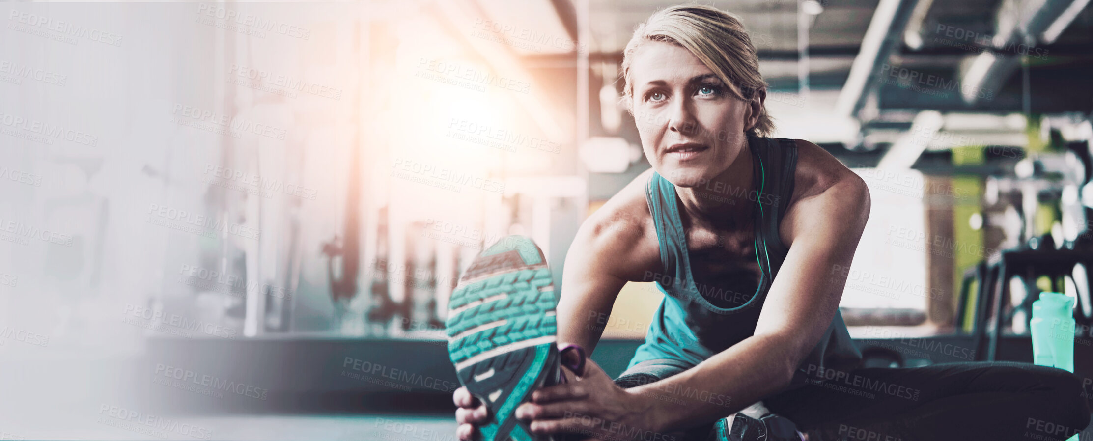 Buy stock photo Woman, exercise or stretching legs in gym for fitness with health, strength training or bodybuilding. Lens flare, space and muscle warm up with banner of athlete for wellness, workout or mobility