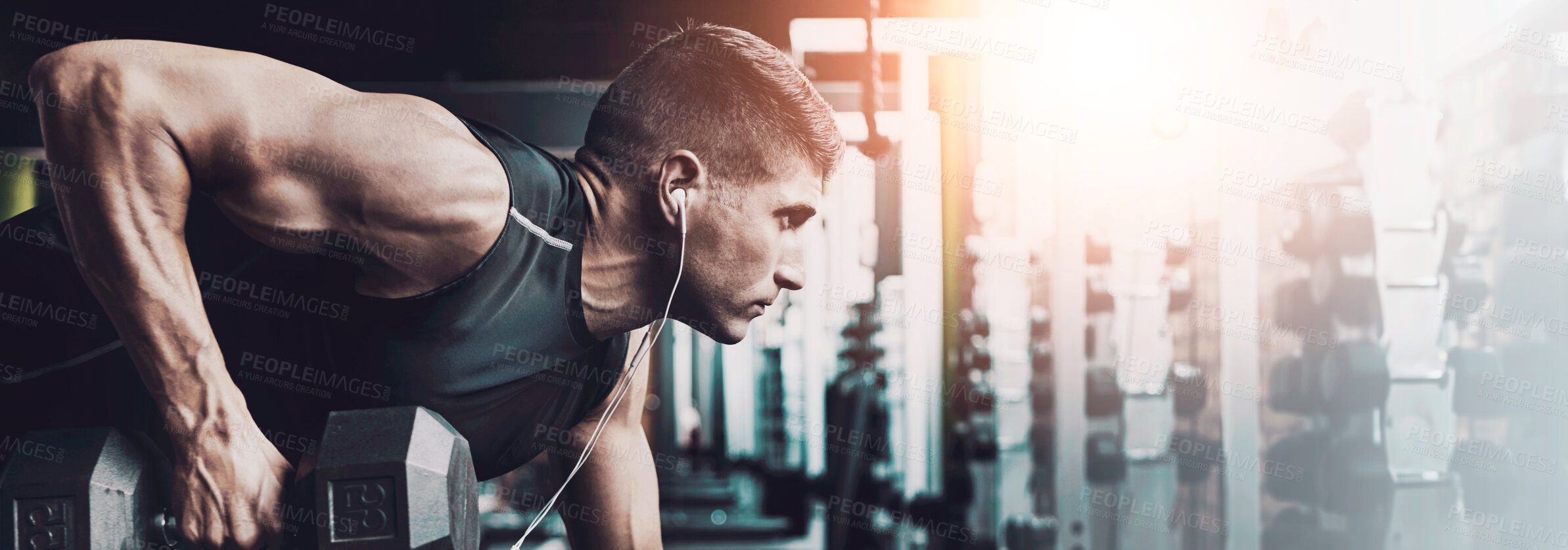 Buy stock photo Shot of a man doing weight training at the gym