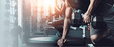 Buy stock photo Shot of a man doing weight training at the gym