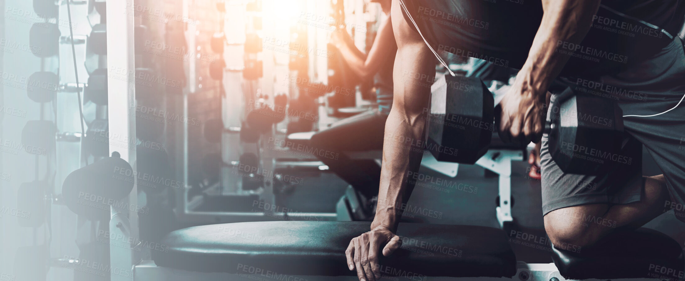 Buy stock photo Shot of a man doing weight training at the gym