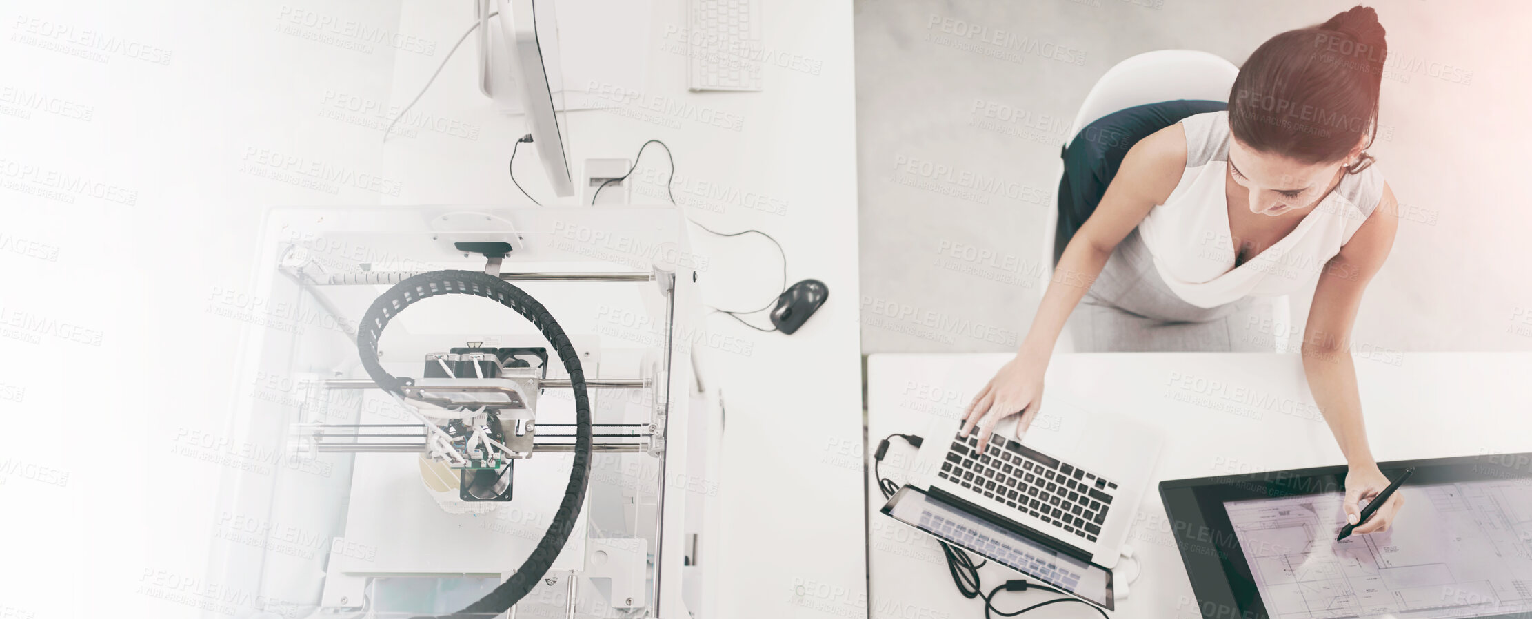 Buy stock photo Cropped shot of an attractive young woman working beside a 3D printer