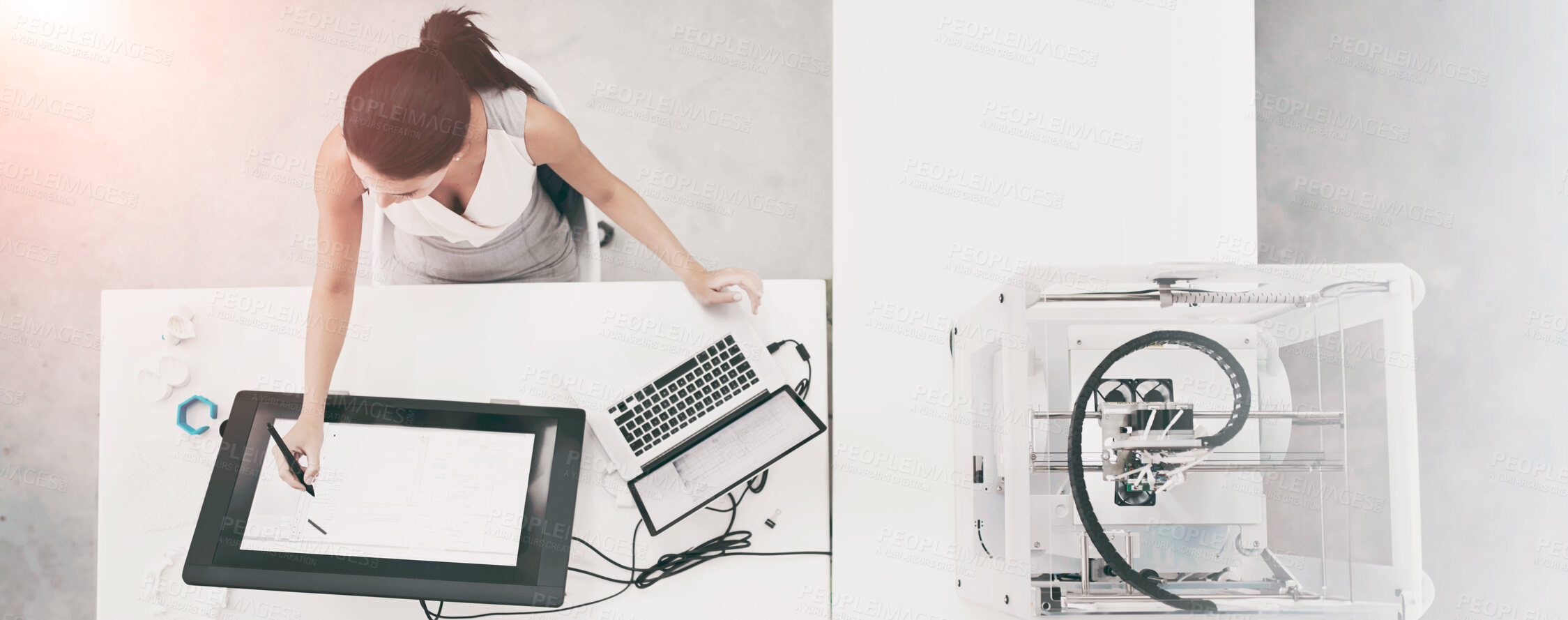 Buy stock photo Cropped shot of an attractive young woman working beside a 3D printer