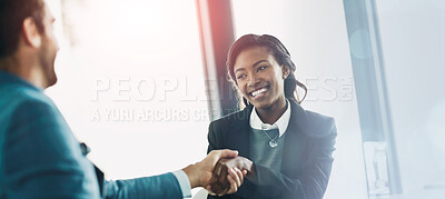 Buy stock photo Cropped shot of businesspeople shaking hands in an office