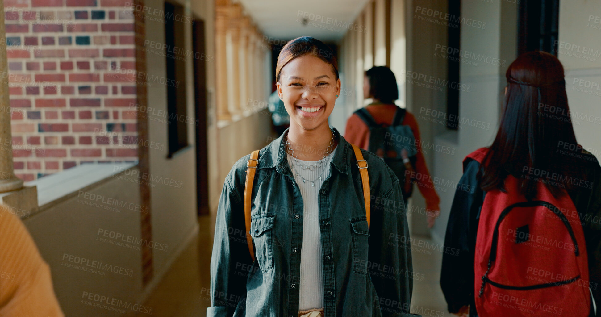 Buy stock photo Happy, corridor and portrait of student at school with backpack for learning, studying or knowledge. Smile, teenager and girl from Mexico in hallway of academy for education class with scholarship.