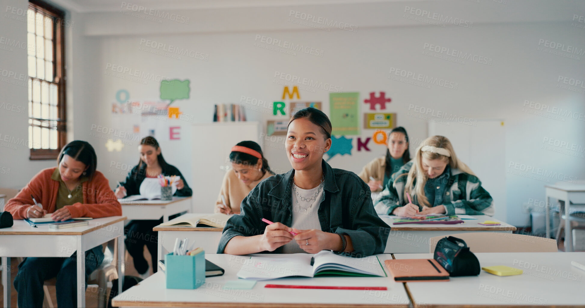 Buy stock photo Notebook, lesson and learning with girl in classroom for education, entrance exam and scholarship. Test, knowledge and future with student in high school for solution, studying and problem solving