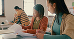 Education, help and students reading notes in classroom with studying for test, exam or assignment. Learning, girls and people working on team project together with books for information at academy.