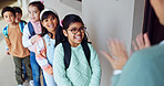 Happy children, teacher and students with line for attendance, interaction or education outside classroom. Young, kids or elementary learners with smile for educator, lesson or learning at school