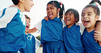 Excited children, soccer and team with hug for celebration, winning or fun competition on field. Young, happy group or elementary kids with smile in huddle for sports victory, match or outdoor game