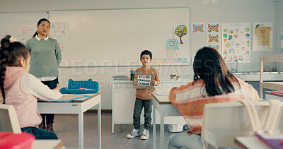 Buy stock photo Boy, child and presentation with poster in classroom to stop climate change with info, opinion and speech. Kid, sign and assessment for public speaking with activism for global warming at school