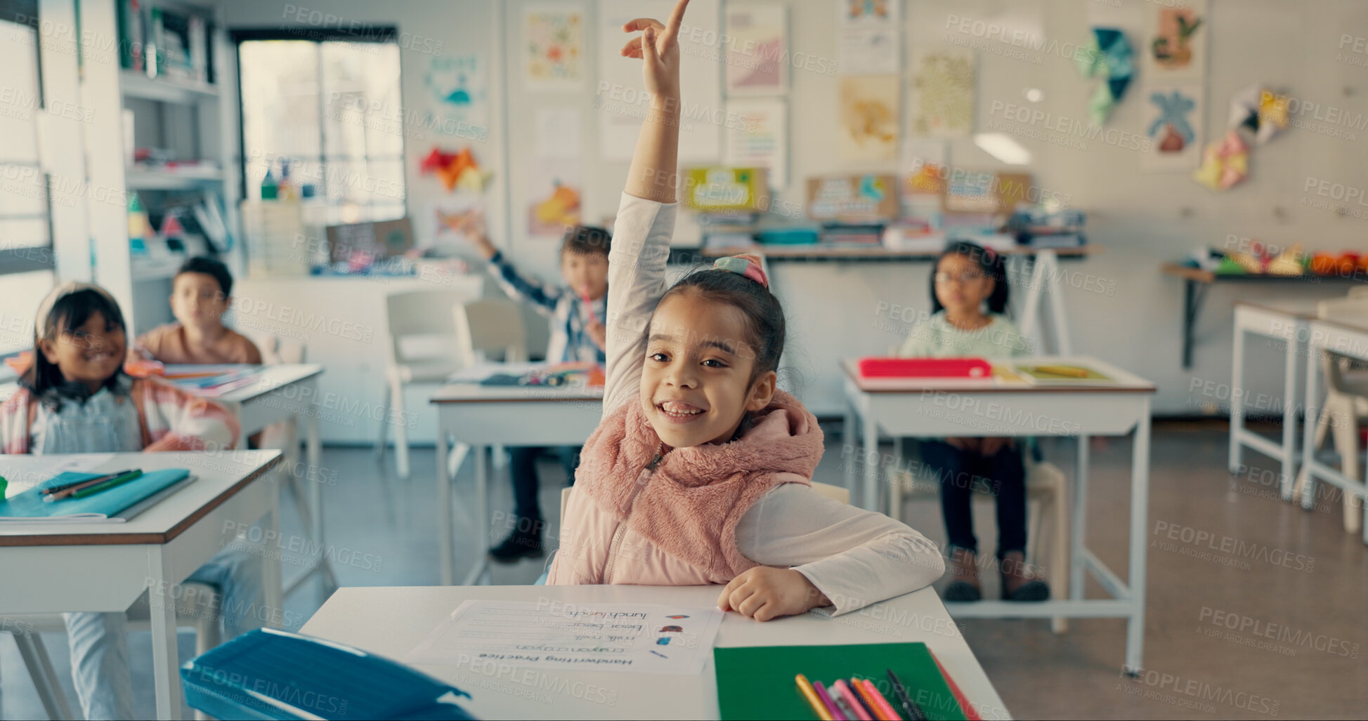 Buy stock photo Girl, child and smile with raised hand in classroom for question, answer and happy with solution for quiz. Kid, excited and nerd for problem solving, learning and assessment for education at school